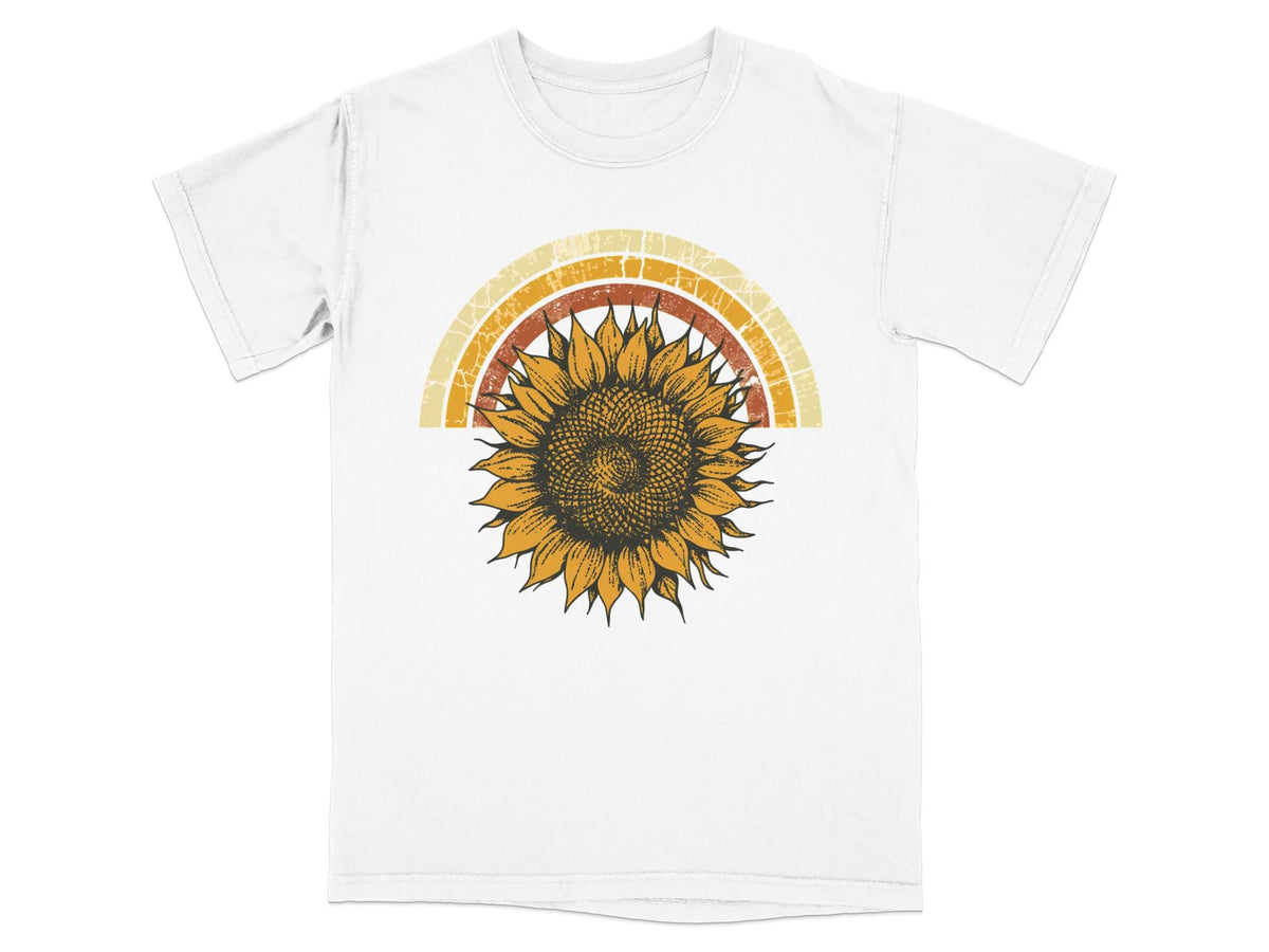 White t-shirt with a sunflower and vintage rainbow graphic.
