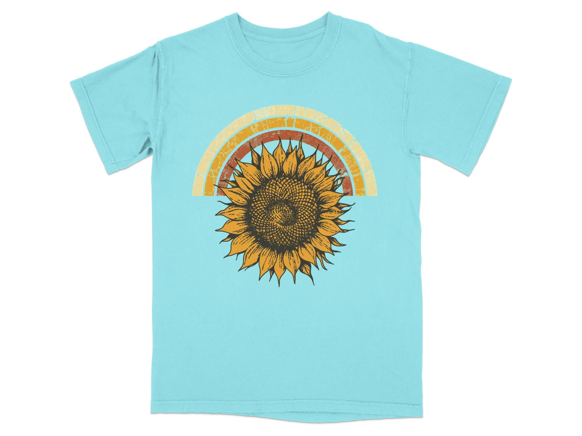 Aqua t-shirt with distressed sunflower and rainbow graphic.