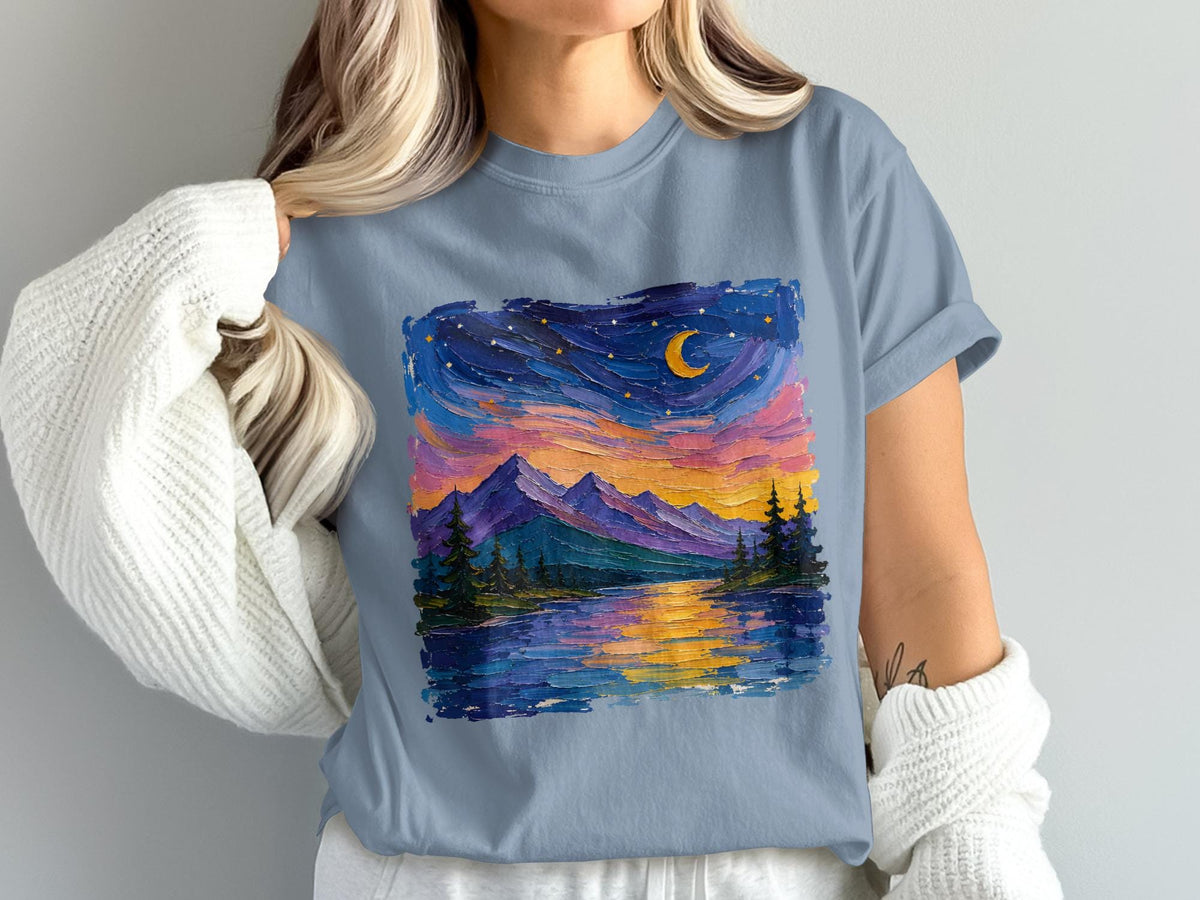 Blue t-shirt with a painted night mountain landscape featuring a moon.