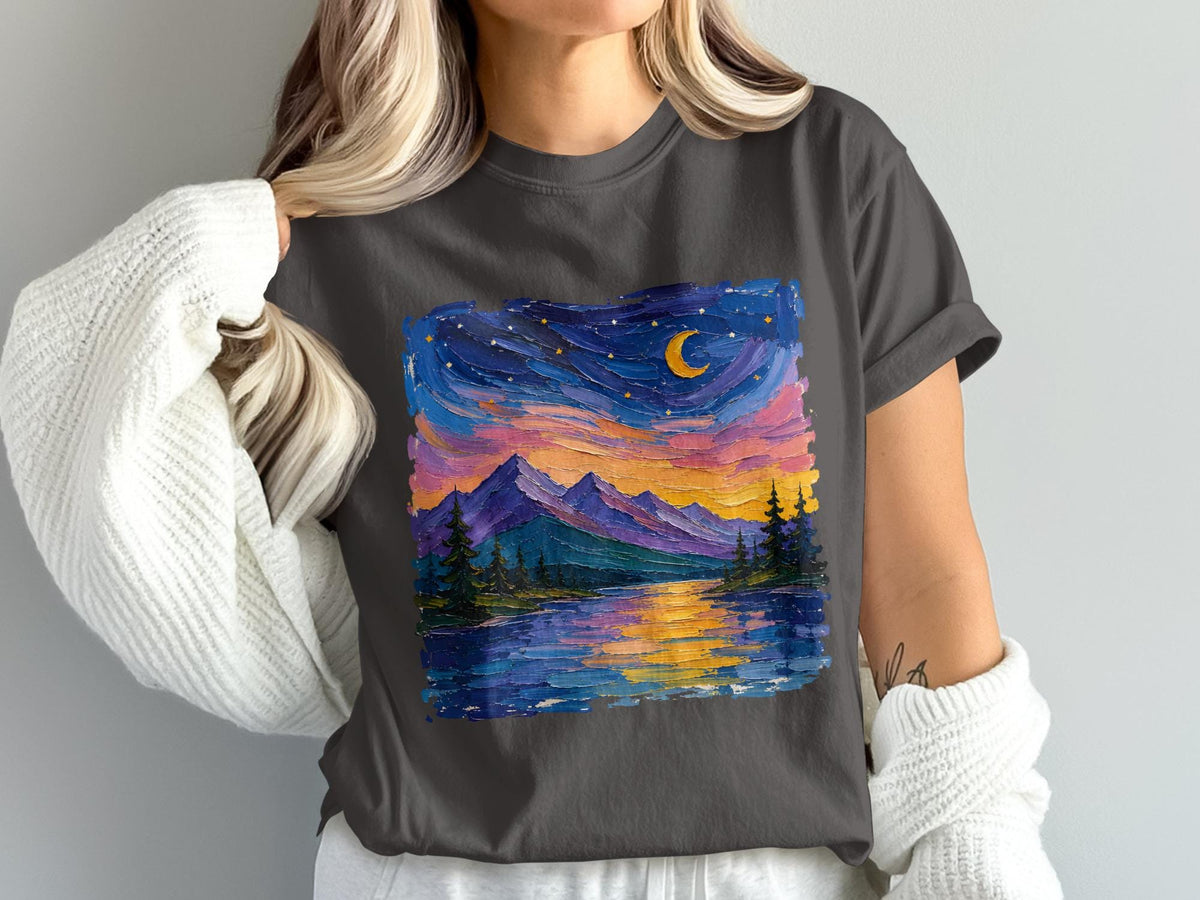 Dark grey t-shirt with impressionistic painting of mountains, water, and starry sky.