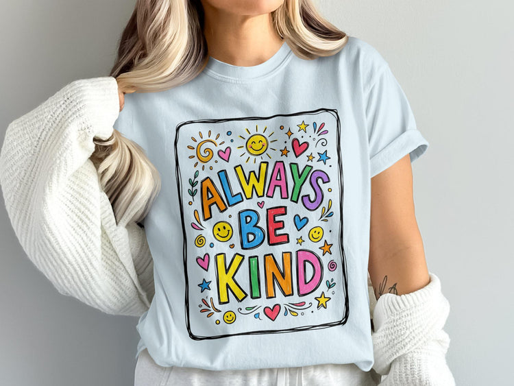 Light blue t-shirt with a colorful "Always Be Kind" graphic and smiley faces.