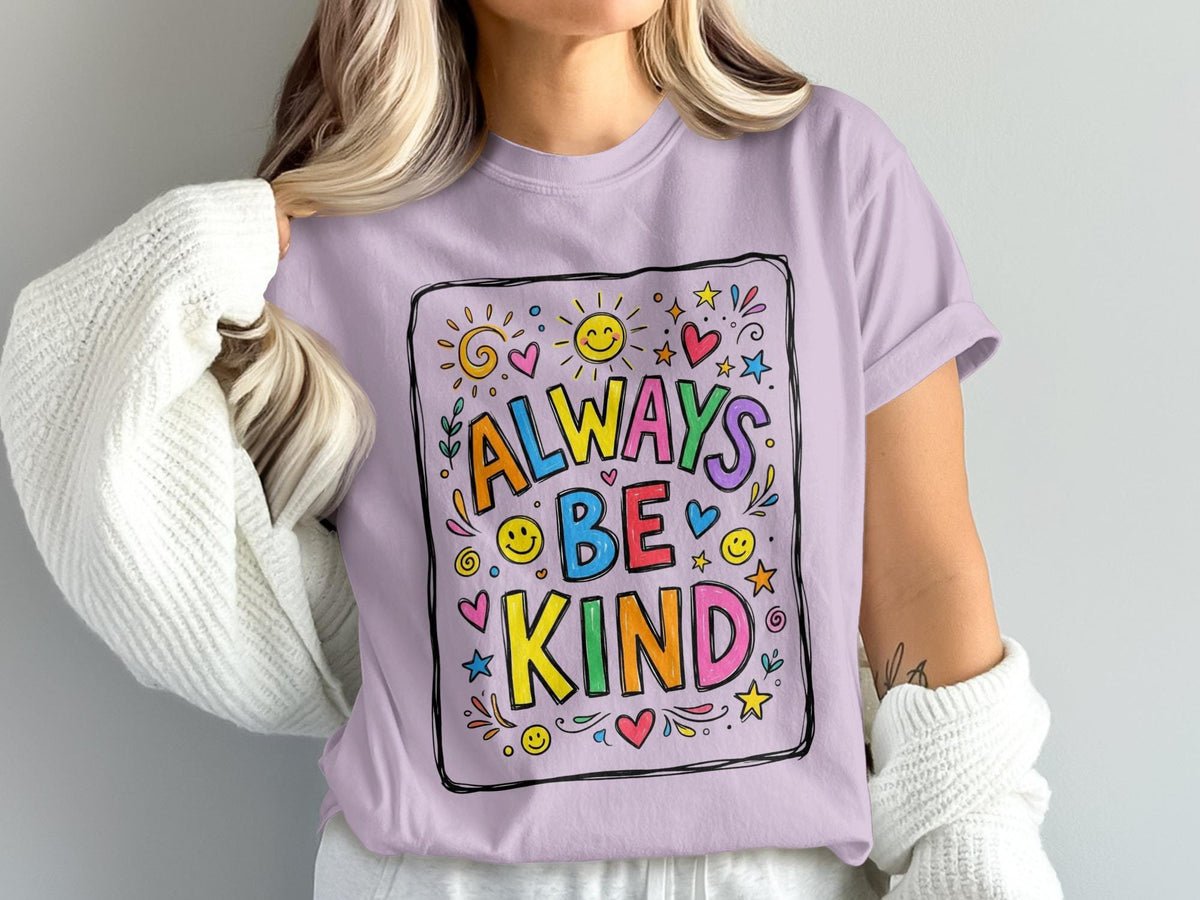 Purple t-shirt with colorful "Always Be Kind" text and doodles.