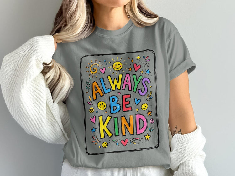 Gray t-shirt with colorful "Always Be Kind" text design and illustrations.