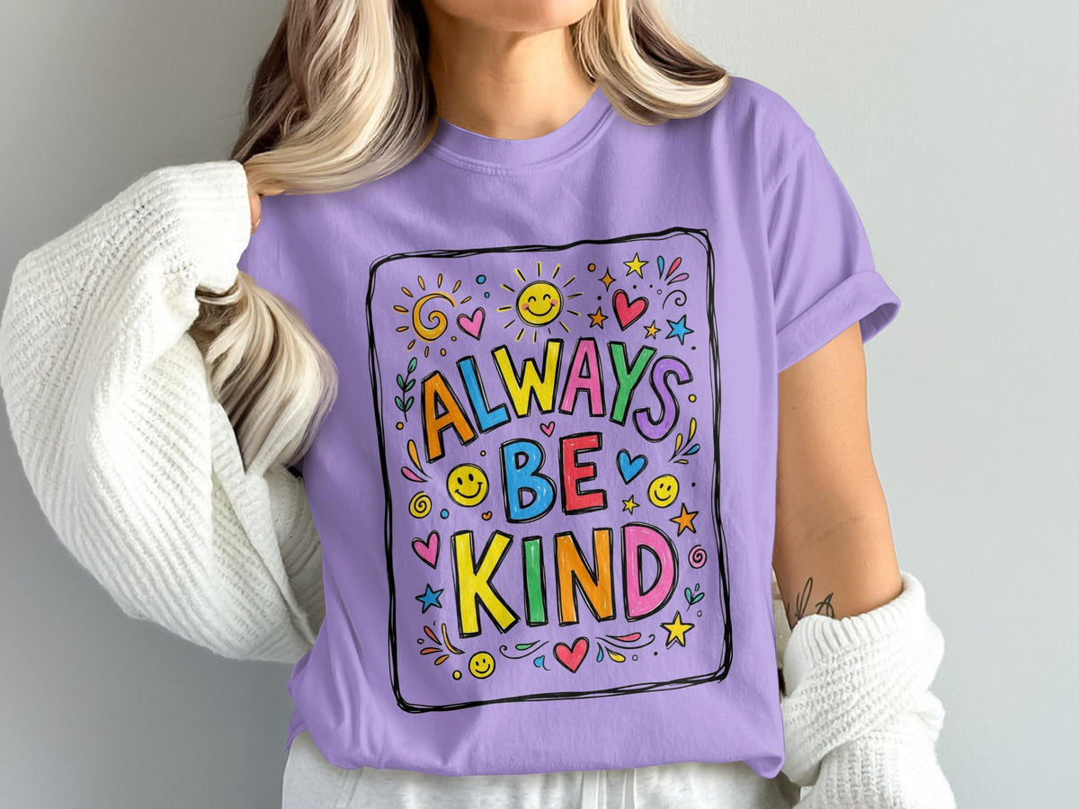 Purple t-shirt with "Always Be Kind" text and colorful drawings.