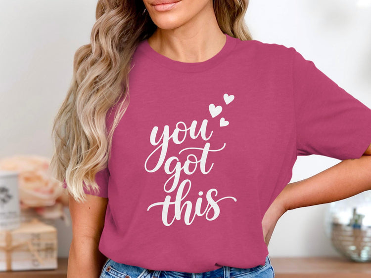 Pink t-shirt with white "you got this" text and three hearts.