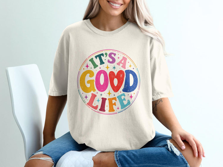 Cream t-shirt with retro circle graphic reading "IT'S A GOOD LIFE".