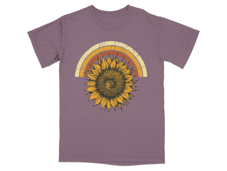 Purple t-shirt with distressed retro rainbow and large sunflower graphic.