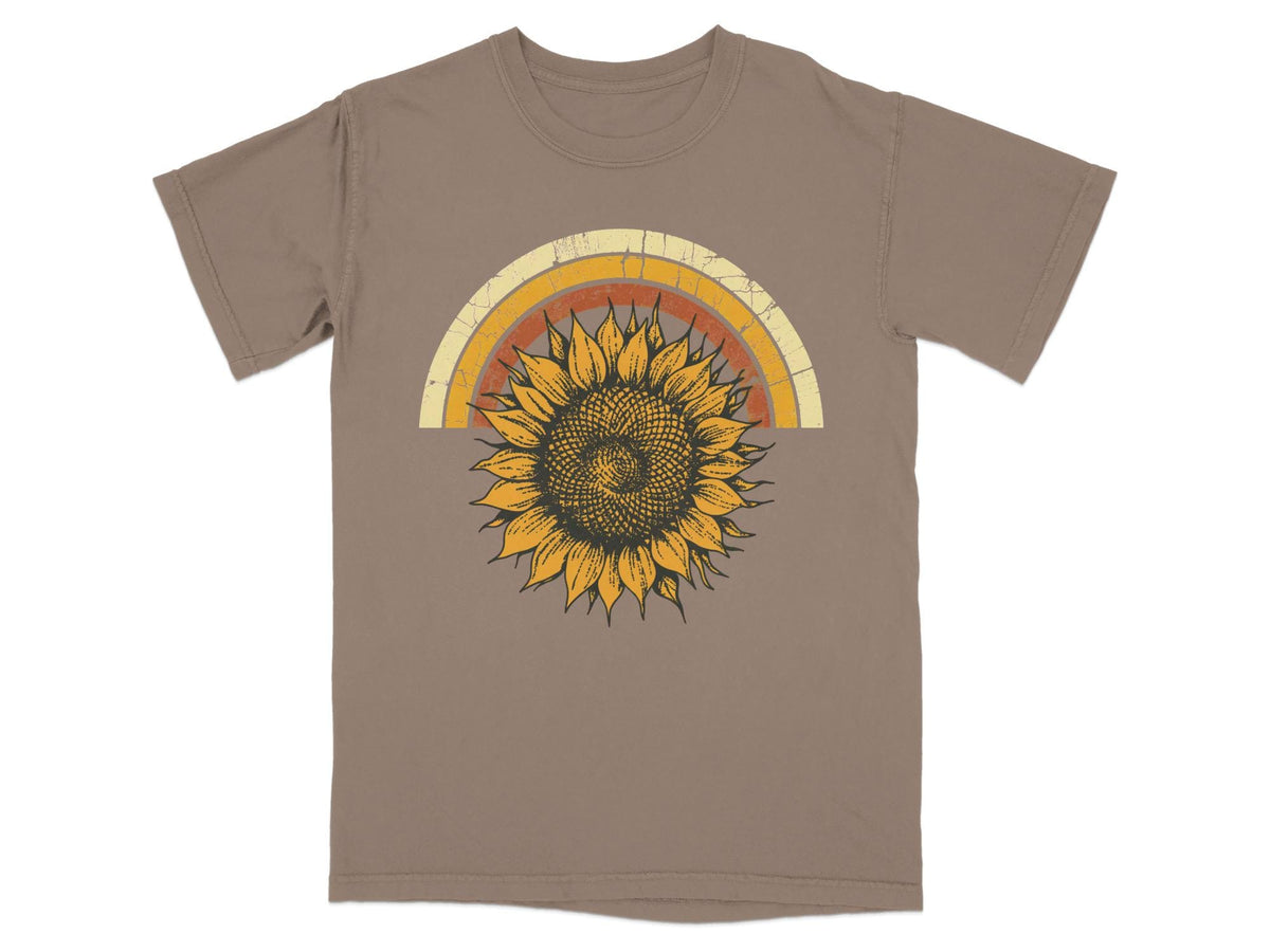 Tan t-shirt with a vintage-style sunflower and sun graphic.