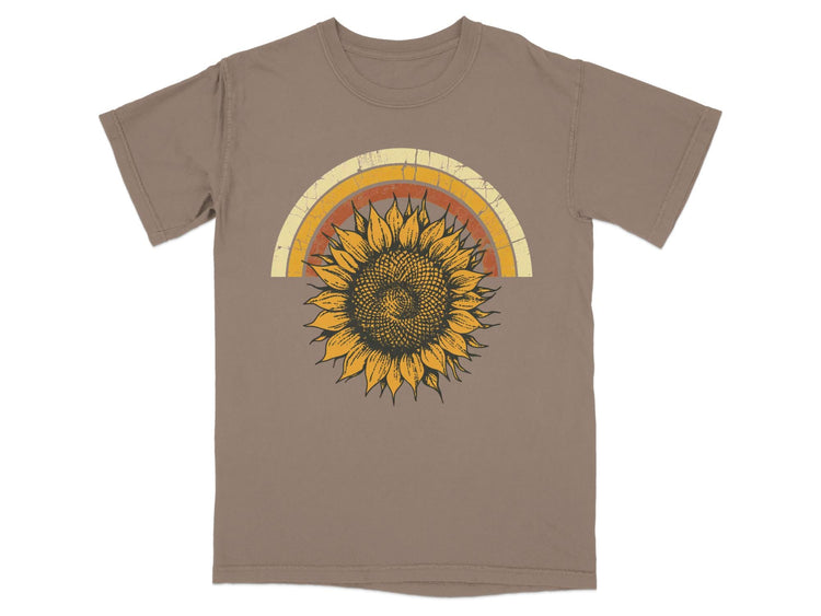 Tan t-shirt with a vintage-style sunflower and sun graphic.