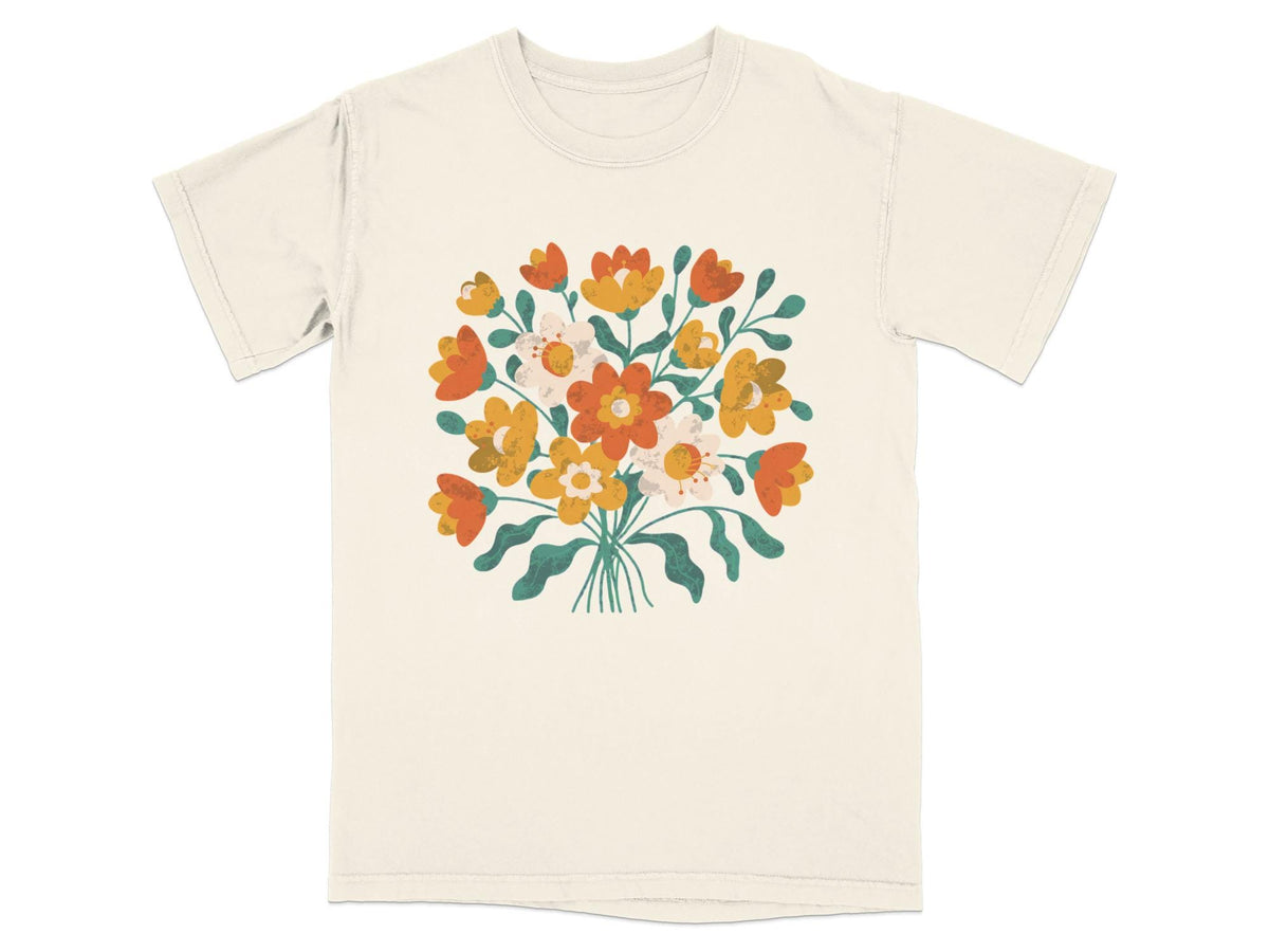 Cream t-shirt with a printed bouquet of colorful floral illustrations.