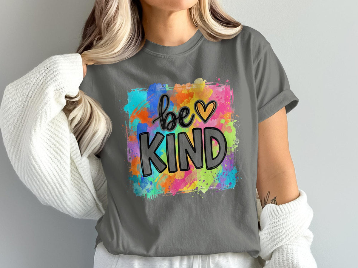 Gray t-shirt with "be KIND" text and colorful paint splatters.