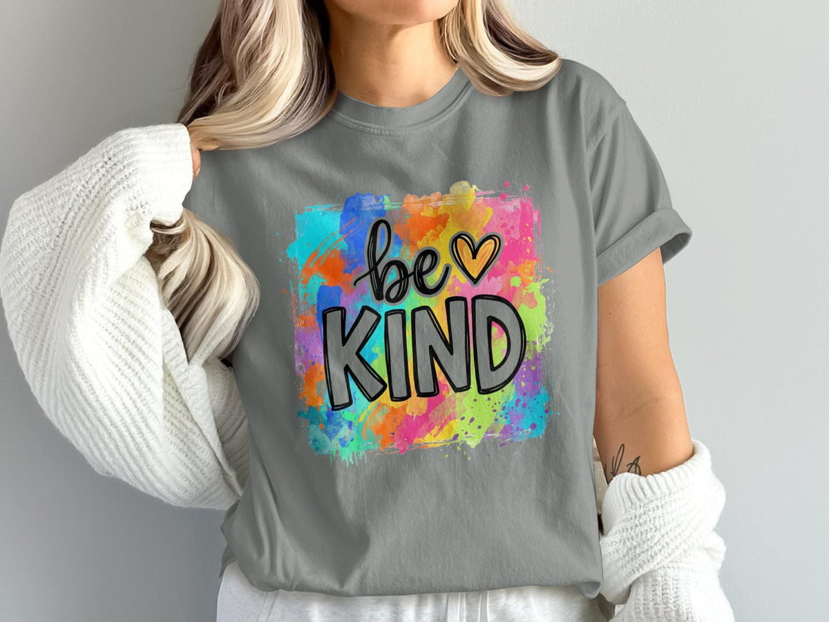 Grey t-shirt with colorful paint splash graphic and "be KIND" text.
