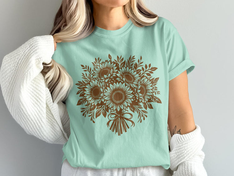 Mint green t-shirt with a brown sunflower bouquet design and bow.