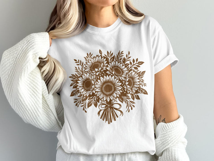 White t-shirt with a brown sunflower bouquet graphic and a ribbon bow.
