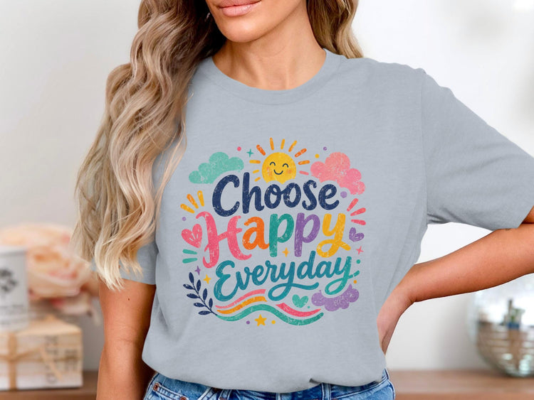 Light blue t-shirt with "Choose Happy Everyday" text and colorful graphics.