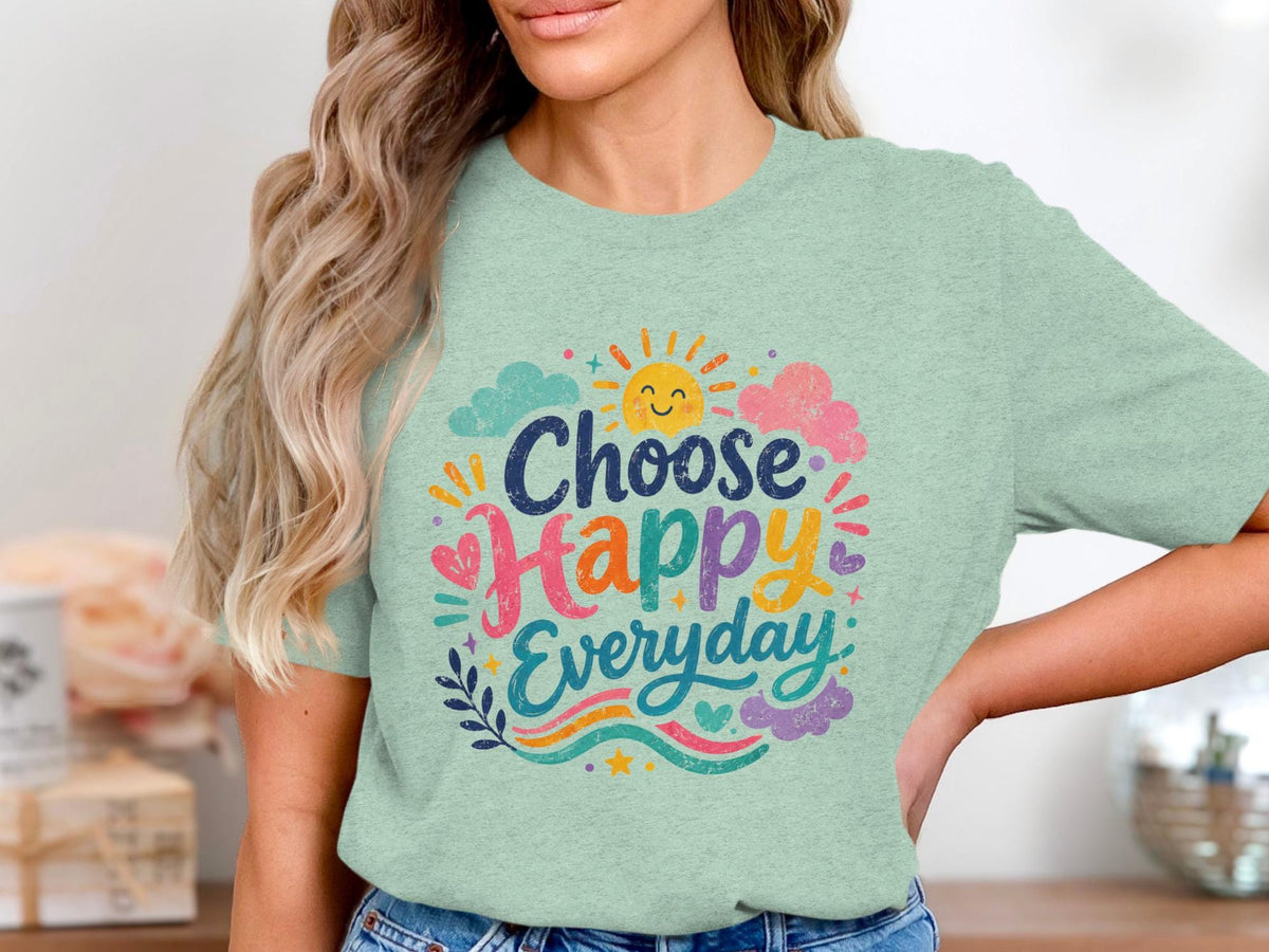 Light green t-shirt with "Choose Happy Everyday" text and colorful sun graphic.