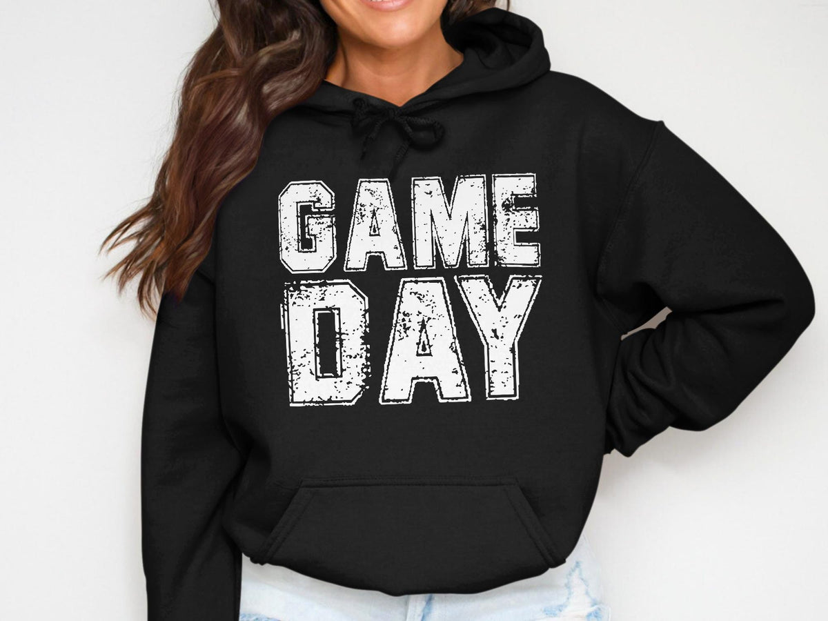 Black hoodie with distressed white text reading "GAME DAY" across the chest.