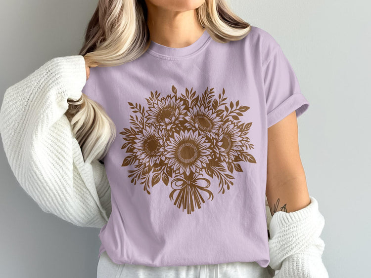 Lilac t-shirt with a brown sunflower bouquet graphic design and bow detail.