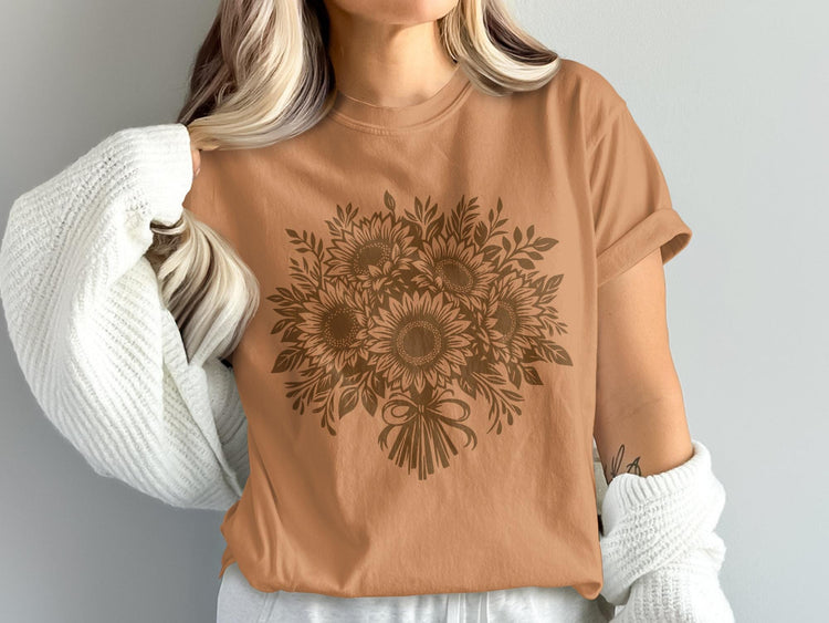 Brown sunflower bouquet graphic on a tan t-shirt.