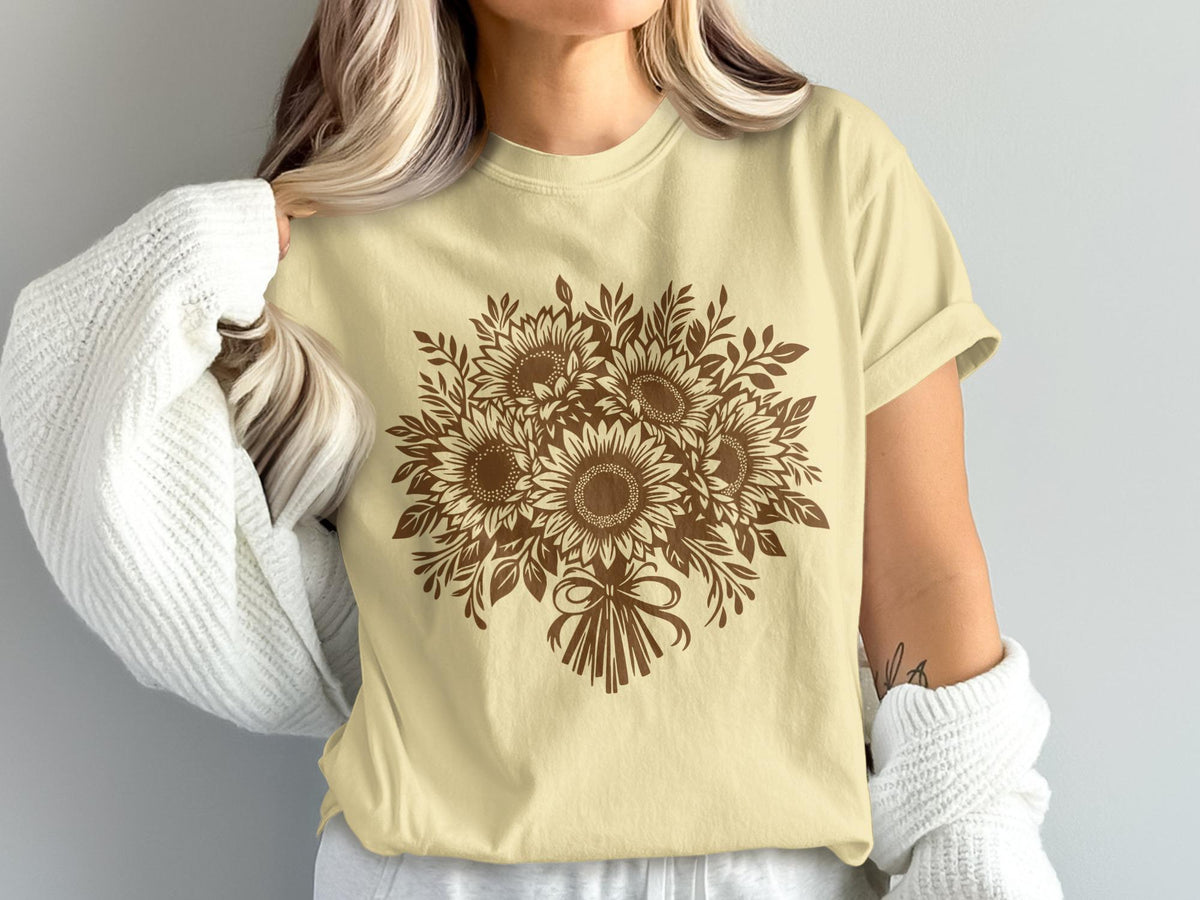 Yellow t-shirt with brown sunflower bouquet graphic and bow.