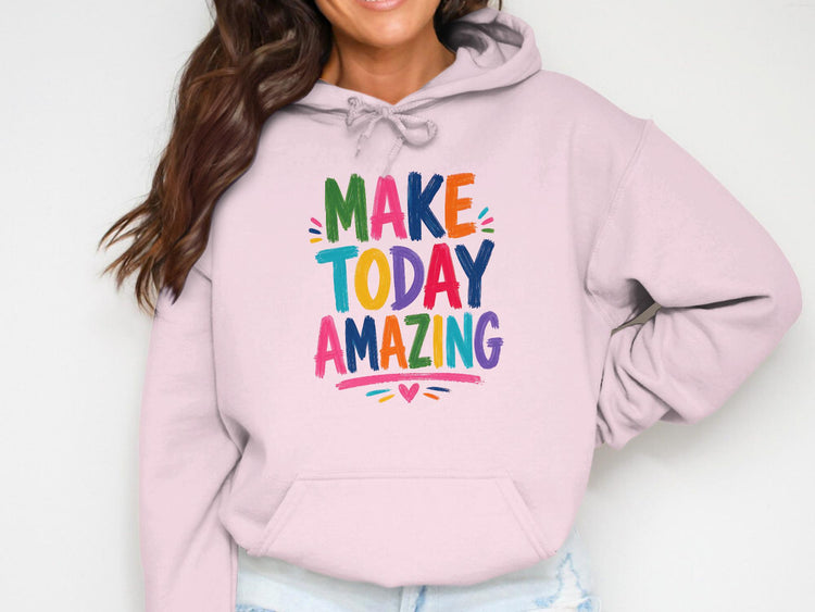 Pink hoodie with colorful "MAKE TODAY AMAZING" text and heart graphic.