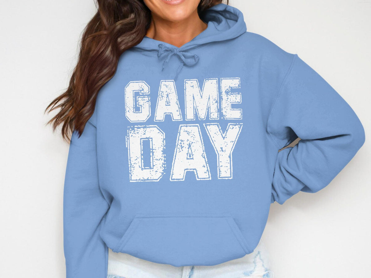 Light blue hoodie with distressed white "GAME DAY" text on the chest.