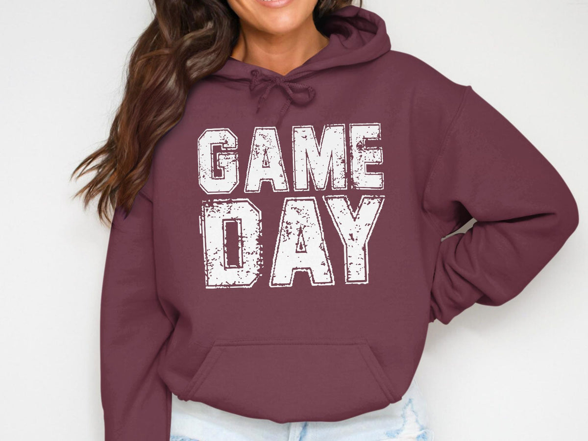 Maroon hoodie with distressed white "GAME DAY" text and a front pouch pocket.