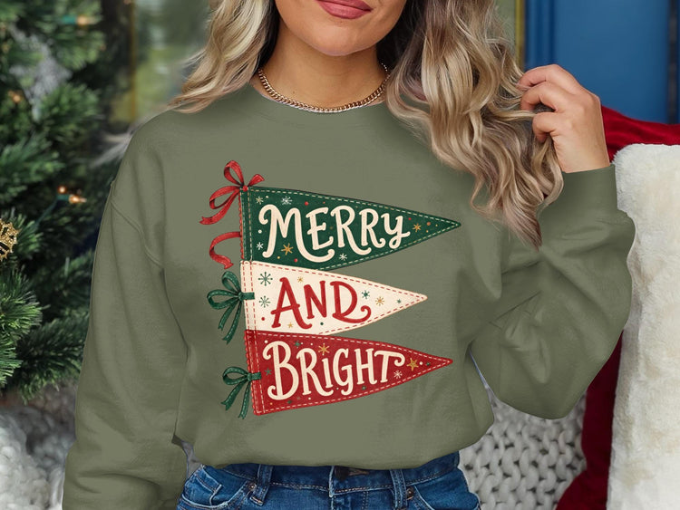 Green sweatshirt with three pennant graphics reading "Merry And Bright".