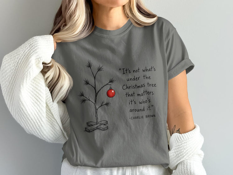 Gray t-shirt with Charlie Brown quote and minimalist Christmas tree graphic.