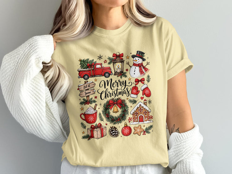 Yellow t-shirt with a collage of Christmas elements including "Merry Christmas" text.